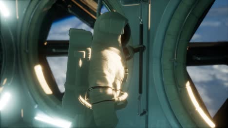 astronaut inside the orbital space station