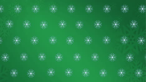 animación de copos de nieve cayendo sobre un fondo verde