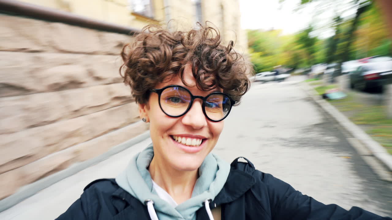 Happy Woman Taking Selfie on City Street