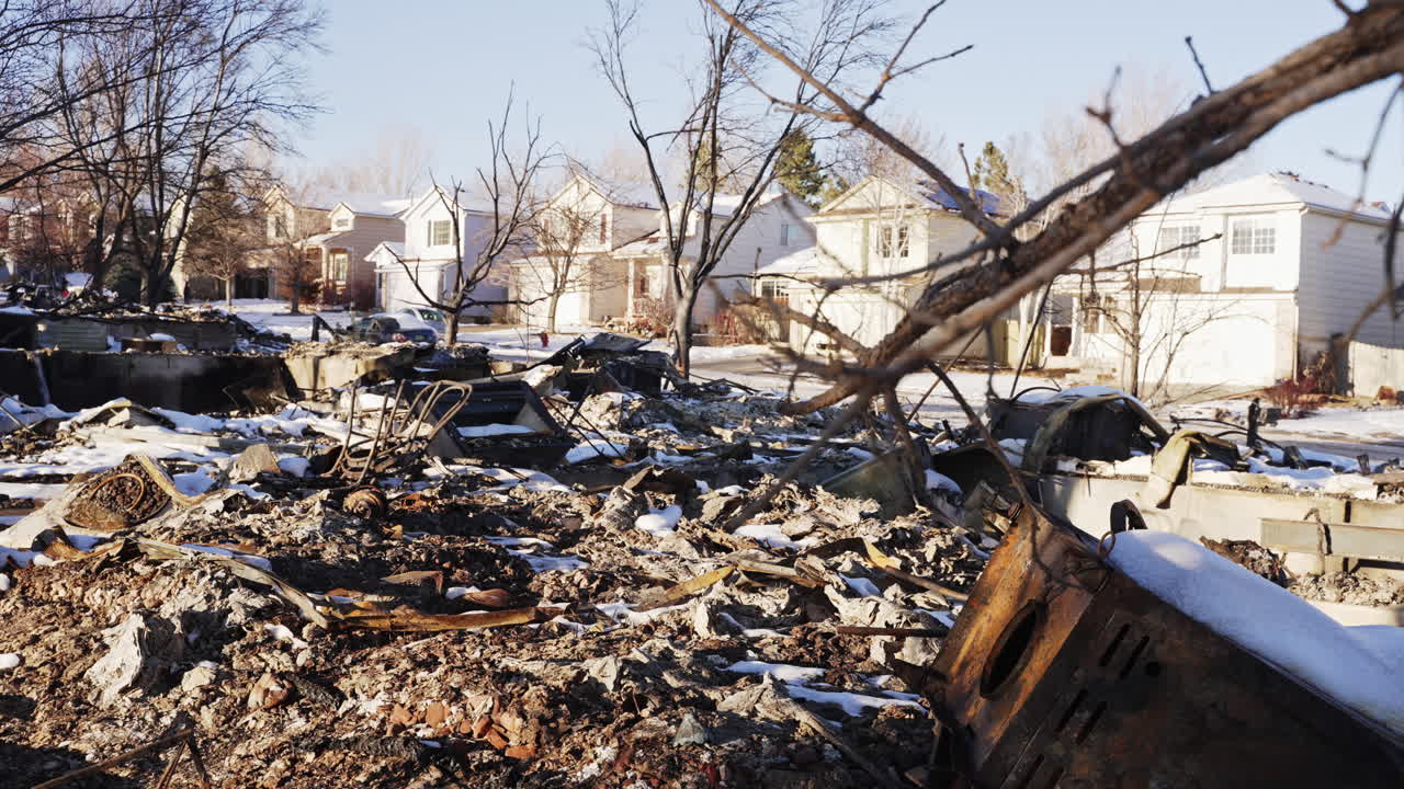 Completely Burnt Down House Remains And Rubble in Superior Colorado Boulder County USA After Marshall Fire Wildfire Disaster.