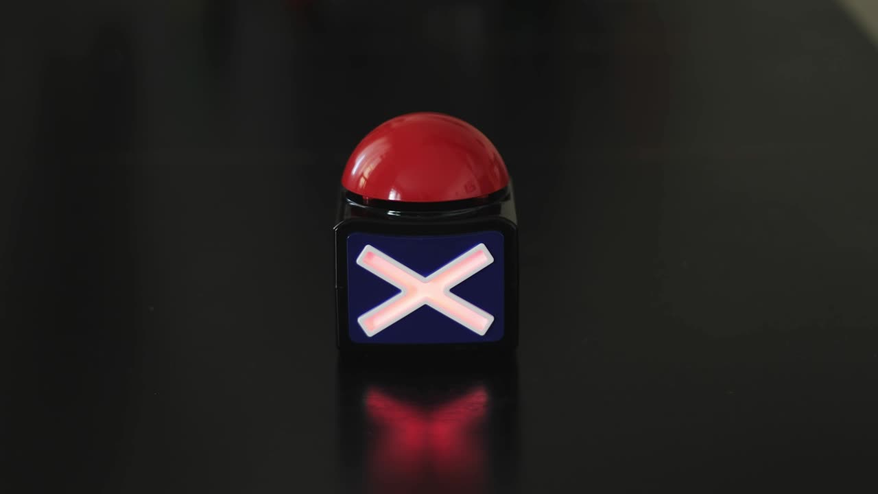 Closeup of female palm presses stop button.