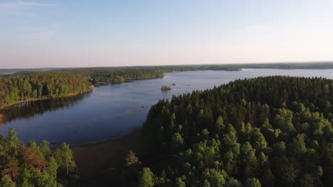 Aerial-of-a-lake-and-forest-in-Sweden