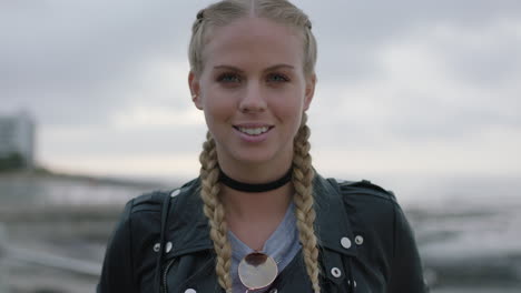 portrait of stylish blonde woman laughing happy looking at camera