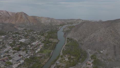 river through frontera comalapa town in veracruz, mexico - aerial drone view