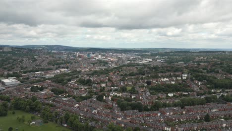 Aerial-drone-footage-ascending-up-over-British-city-suburbs