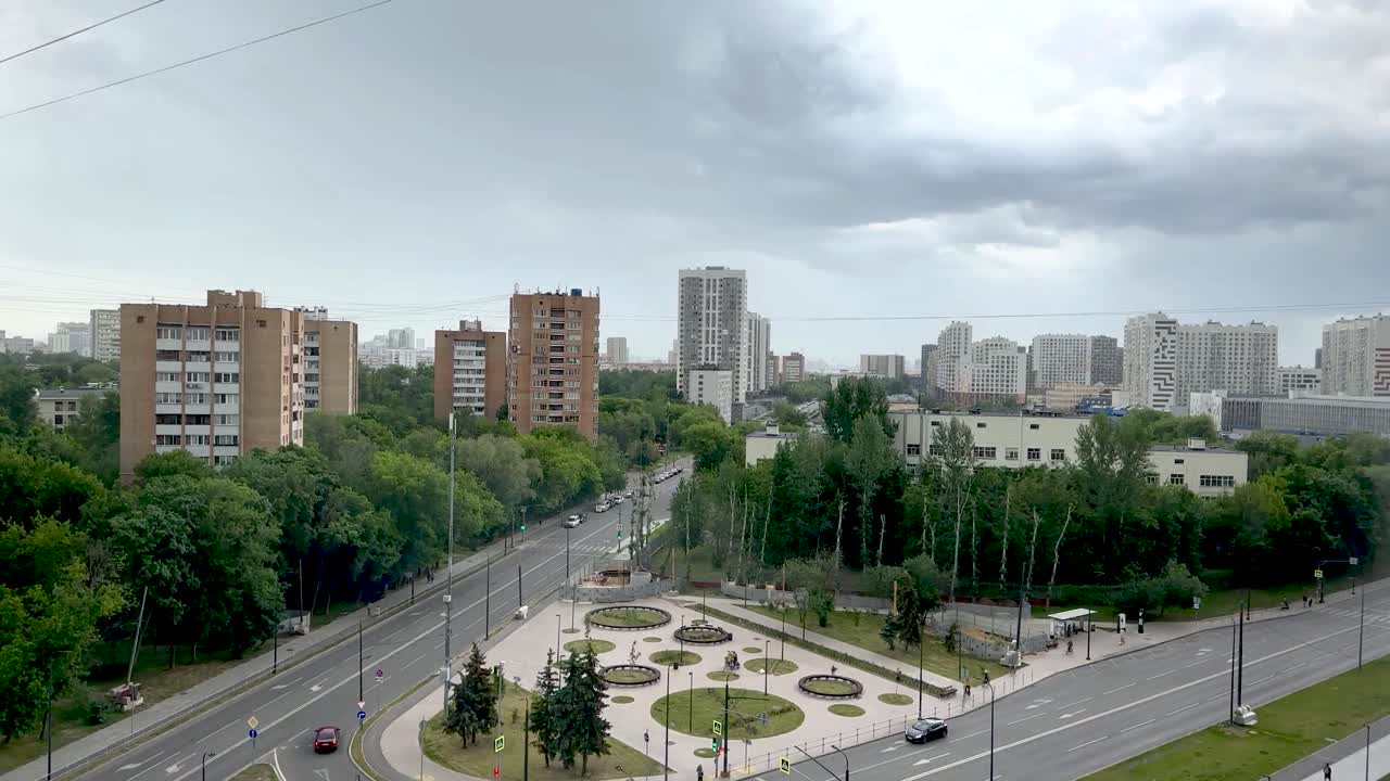 Storm clouds, strong wind and heavy rain in the background (4K, timelapse)