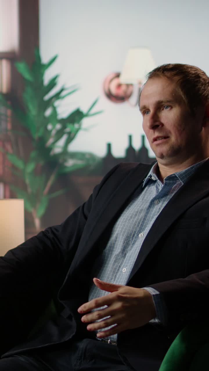 Professional Man Speaking and Gesturing During an Interview