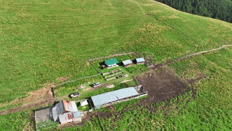 aerial-footage-of-a-village-in-a-mountain,-Sinaia,-Romania