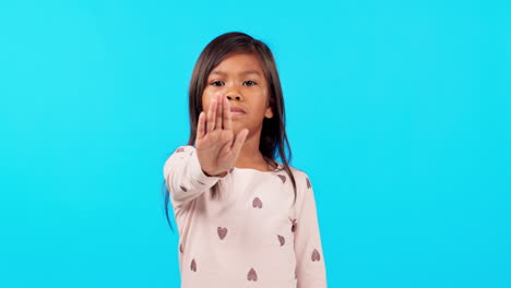 Girl-child,-hand-and-stop-in-studio