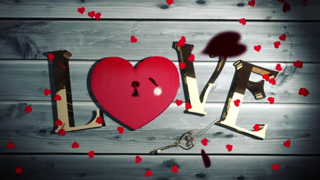 confeti de corazón cayendo en el texto de amor dorado con bloqueo de corazón
