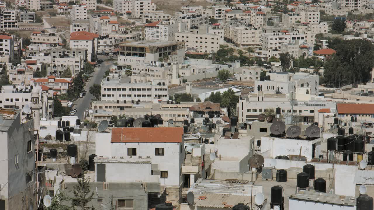 Jenin, Palestine, West Bank, Close view, Jenin houses and buildings, of Jenin city in northern west bank. 4K footage