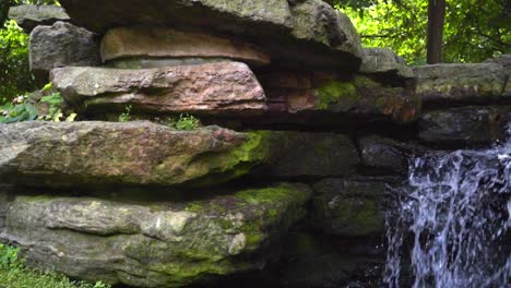 Waterfall-in-forest.-Flowing-water-in-large-rocks.-Natural-river-waterfall