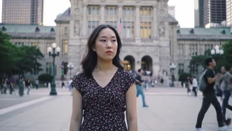 young woman in city plaza
