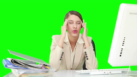 Businesswoman-feeling-stressed-at-her-desk