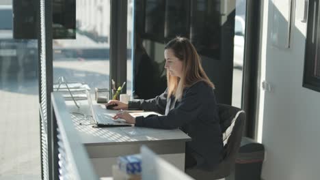 car service manager working at desk in office