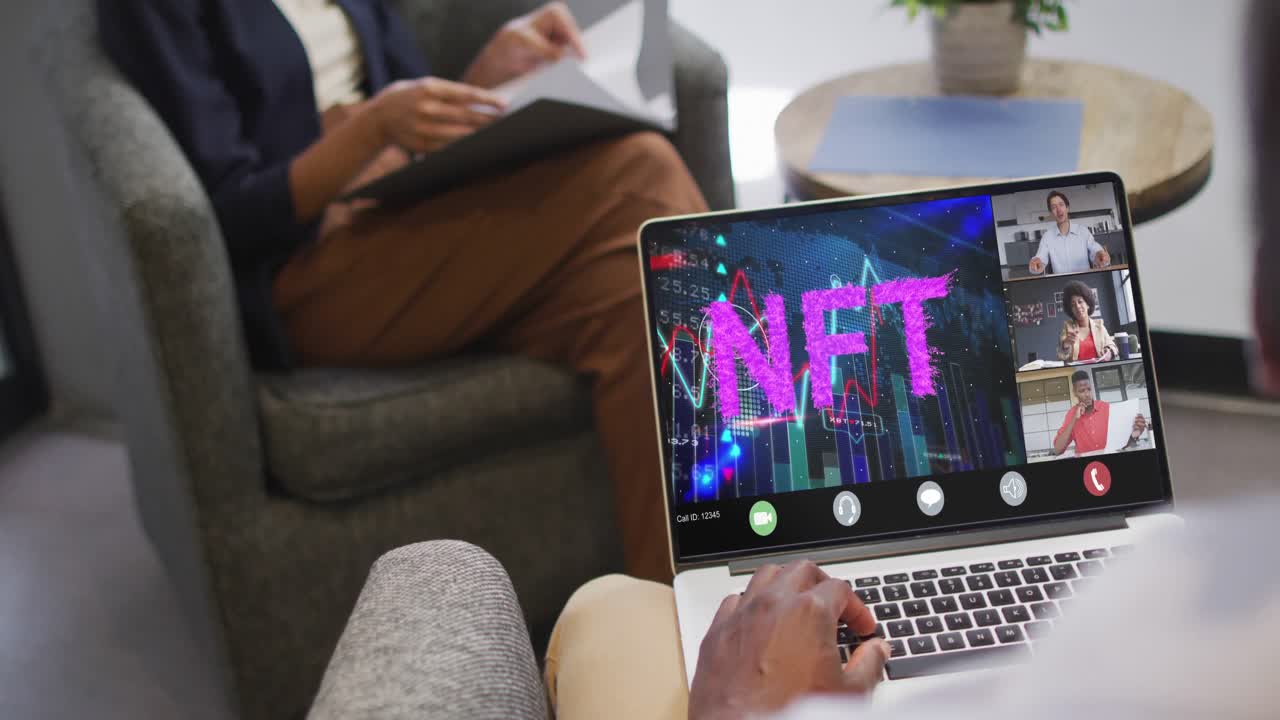 Video of biracial woman having nft video call on tablet with diverse coworkers