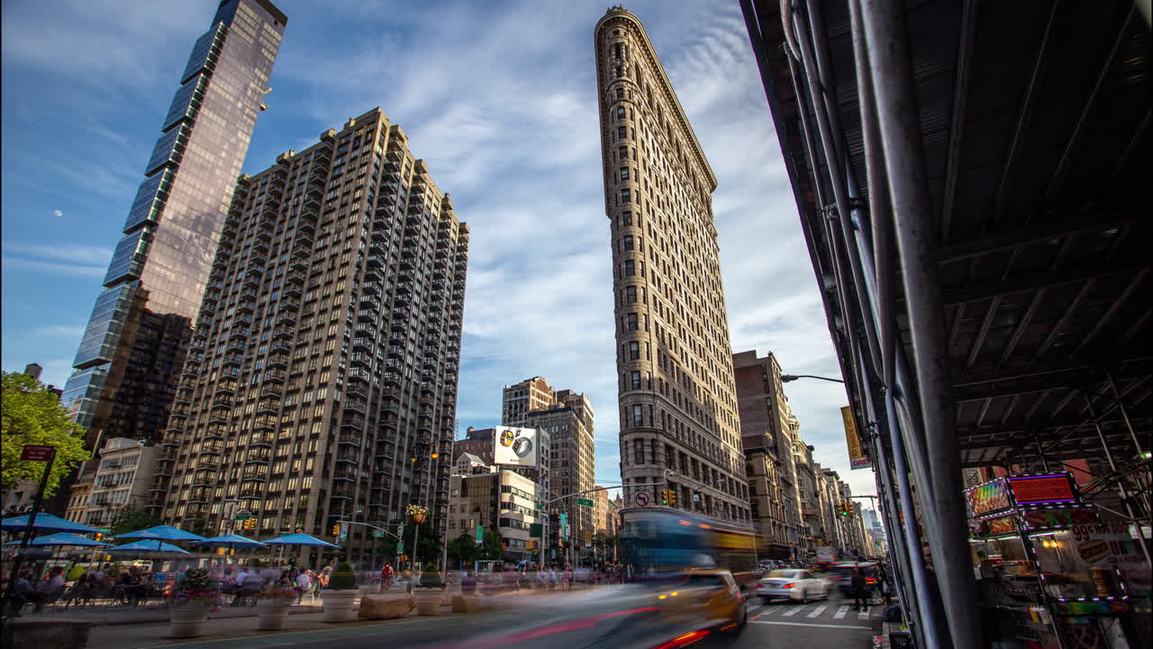Flatiron Building and Bustling City Street in New York City
