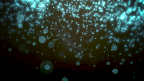 blue bokeh and particles falling happy new year and merry christmas