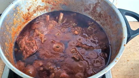 delicious dark stew simmering in a pot