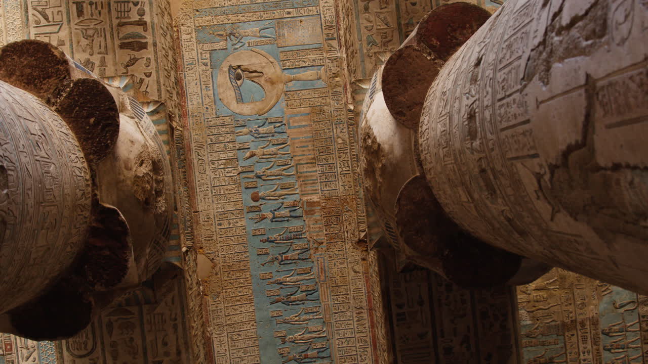 Ancient ceiling art in Dendera temple with vivid blue and detailed carvings