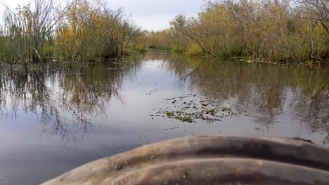 Quick-moving-backed-up-flood-water-flowing-through-a-culvert-after-a-beaver-dam-blockage-was-removed