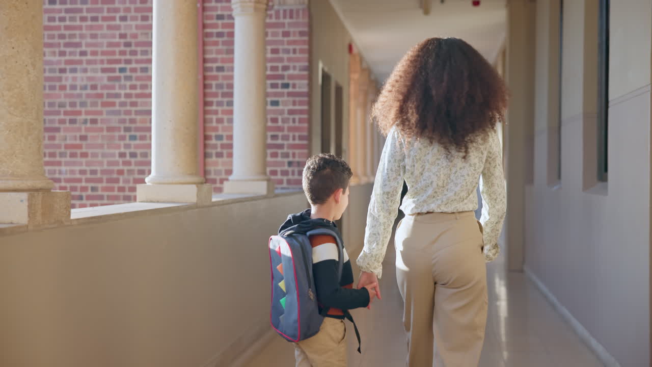 School, child and mother holding hands walking to