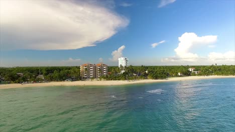 miami beach with clear blue water and fluffy clouds in the sky, sunny day, aerial view, in america