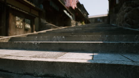 stone steps leading up through a traditional japanese town