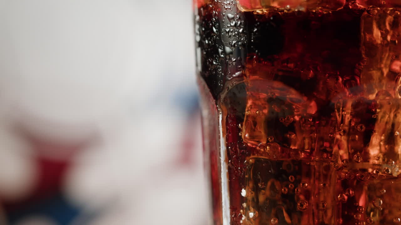 Close-up of a glass of soda with ice