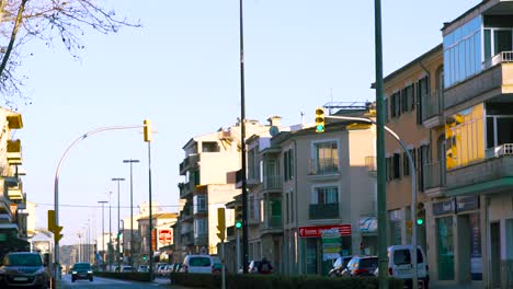 city street scene with traffic lights and buildings