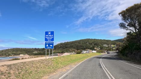A peaceful drive through lush landscapes and coastal views on a sunny day along the Great Ocean Road