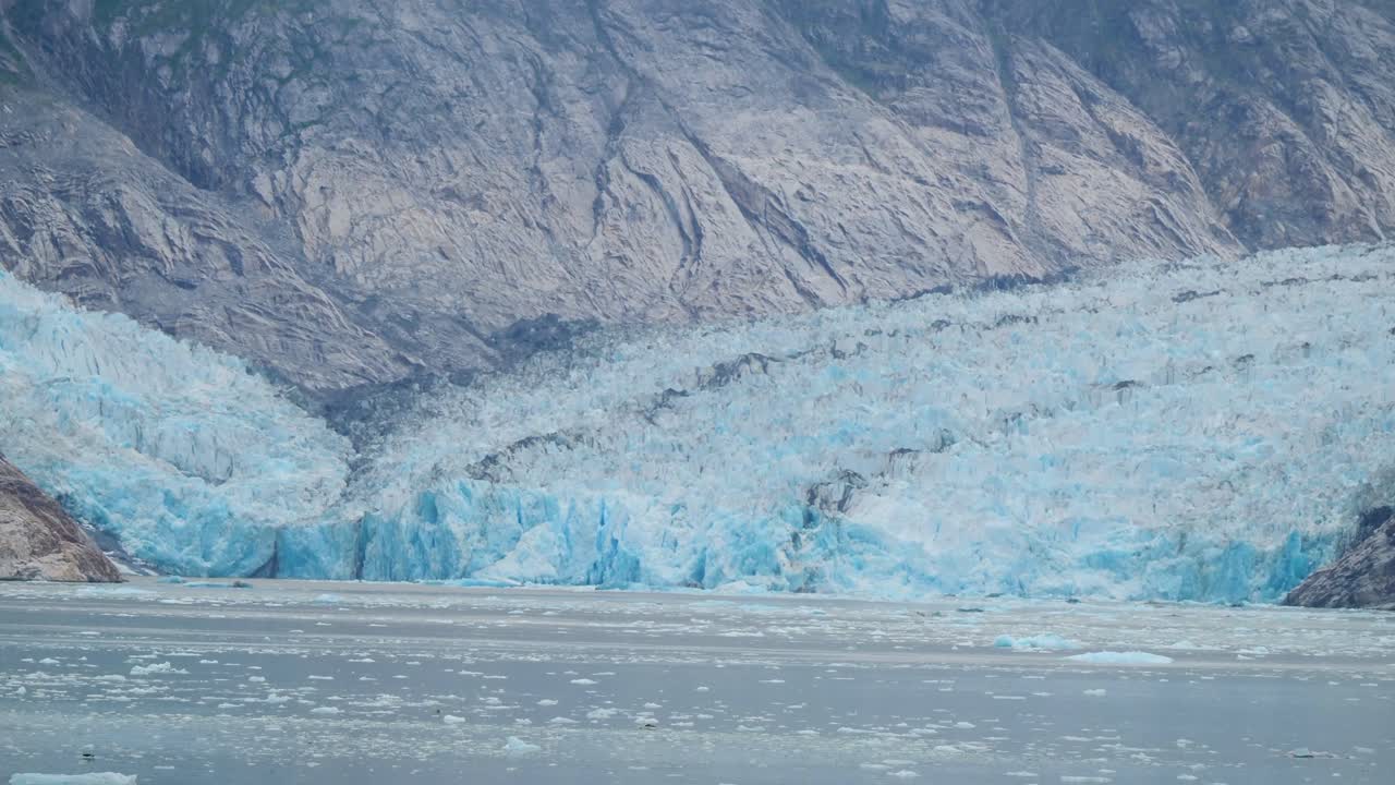 Dawes Glacier is an active tidewater glacier located at the head of the Endicott Arm fjord, Alaska.