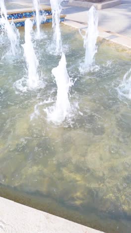 a fountain with water shooting out of it