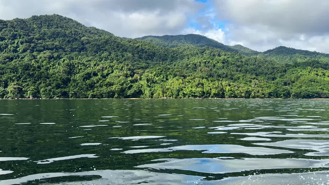 Passing the jungle mountains in the Masuala National Park, Madagascar, Africa 4K
