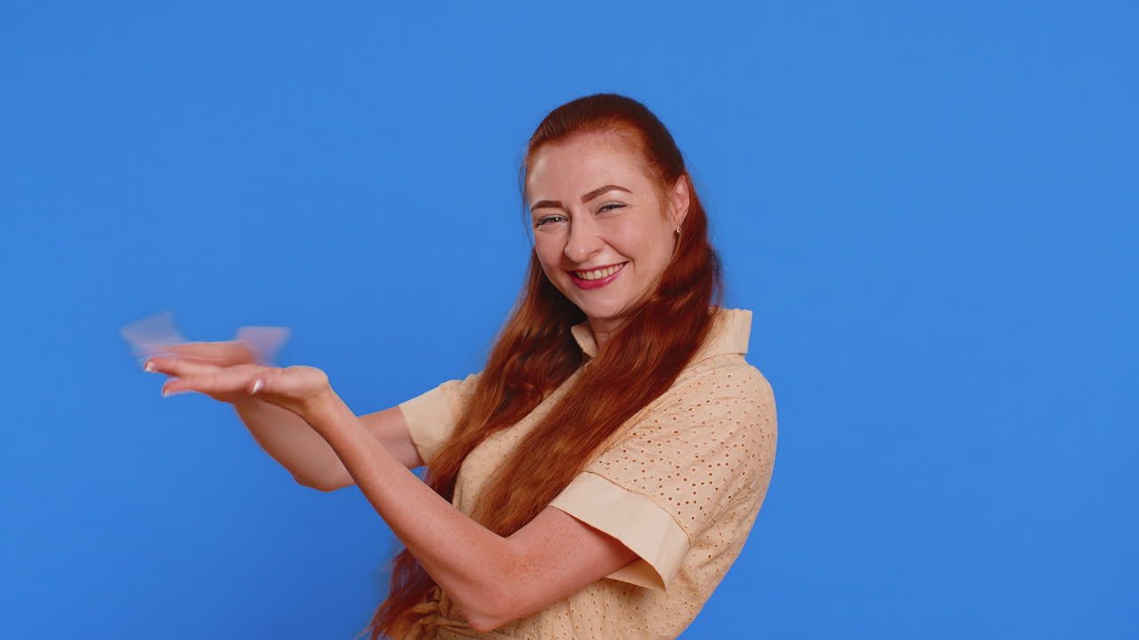 Woman showing wasting throwing money around more tips big profit winning lottery jackpot shopping