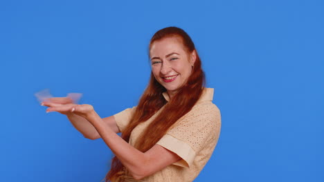 woman showing wasting throwing money around more tips big profit winning lottery jackpot shopping