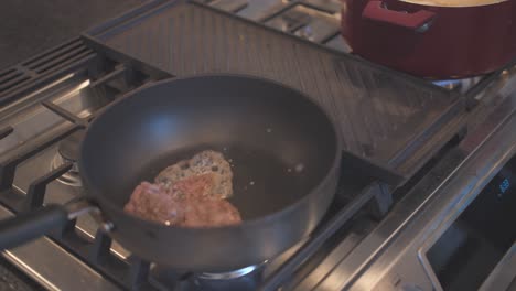 cooking ground beef in a skillet