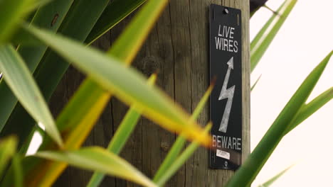 electricity safety sign on a pole