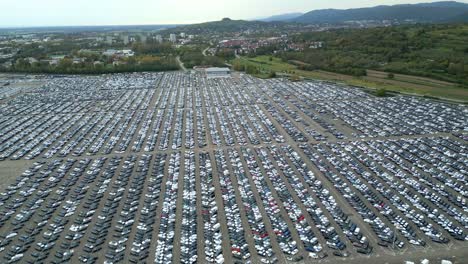 Many-cars-on-a-parking-lot-from-above,-filmed-with-a-drone-in-4k,-High-Quality