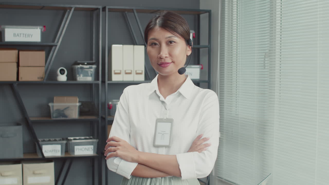 Female Worker of Repair Service Looking at Camera