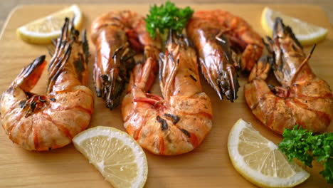 grilled tiger prawns or shrimps with lemon