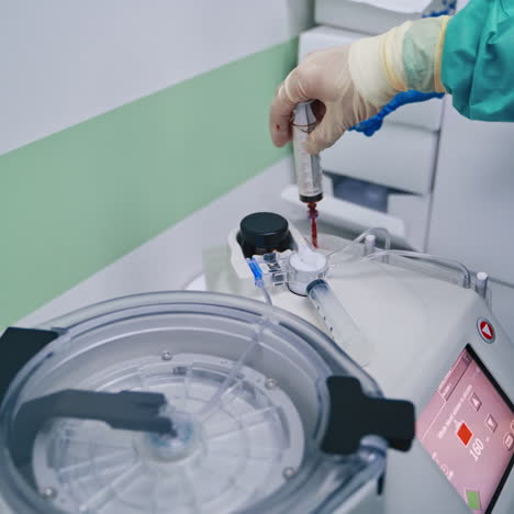 stem cell therapy. plasma in syringe. centrifuge.