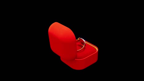 hermoso anillo de oro costoso con diamantes en una caja de joyas roja, aislado - video de bucle