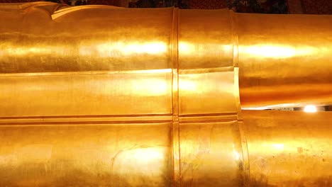 close-up views of the reclining buddha statue