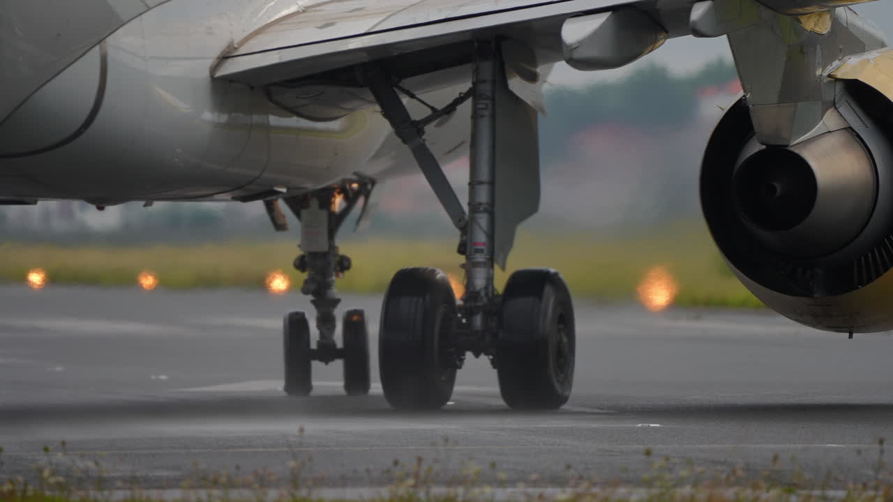 Close-up view of an aircraft engine amidst a natural environment