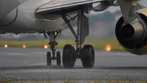 close-up view of an aircraft engine amidst a natural environment