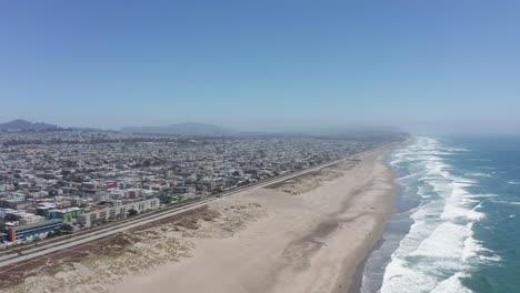 descending and panning aerial shot of ocean beach in san francisco