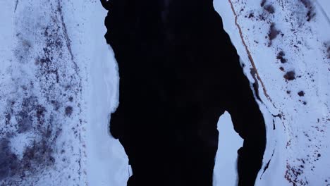 a drone's view of calgary's houses during a beautiful winter sunrise
