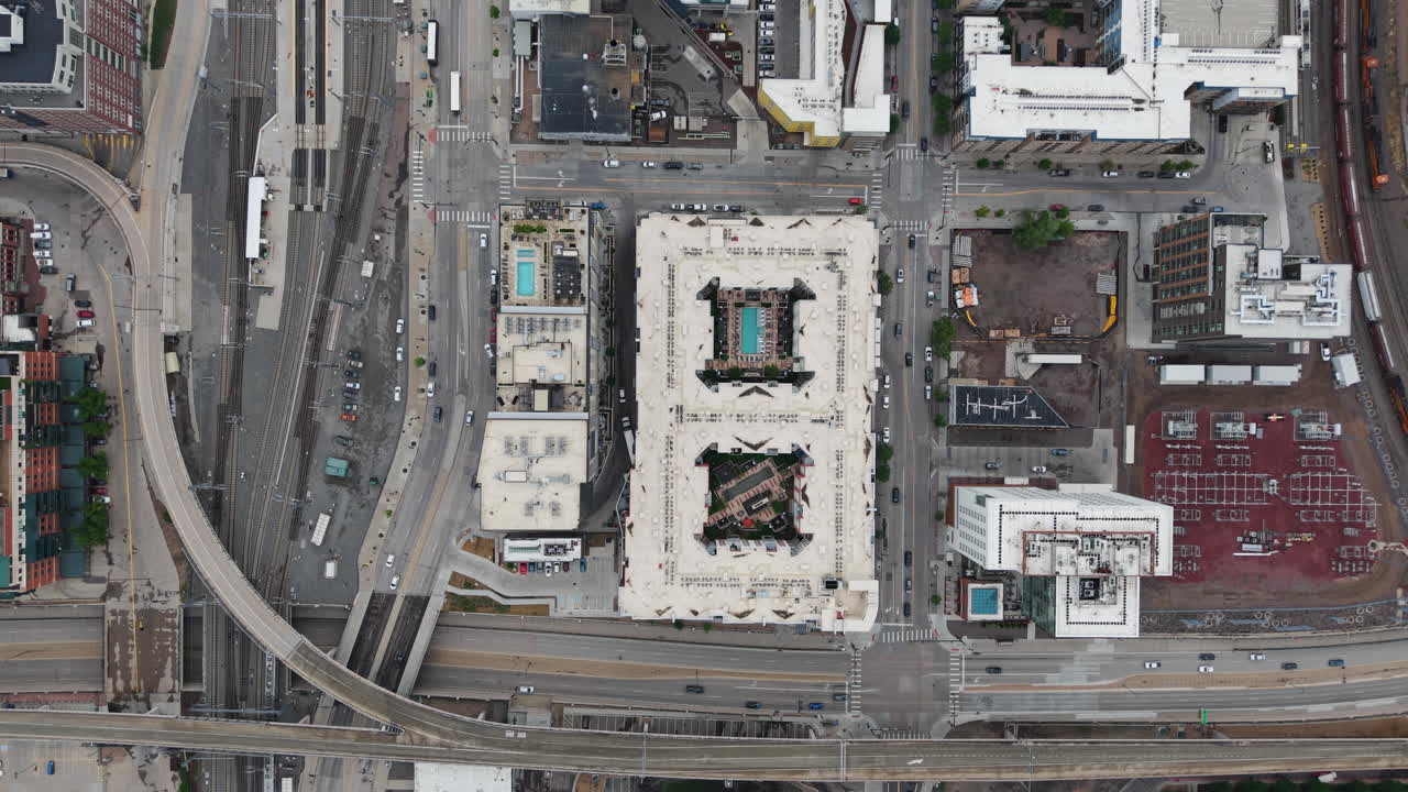 Top down drone shot over the Union station district of Denver city, cloudy day