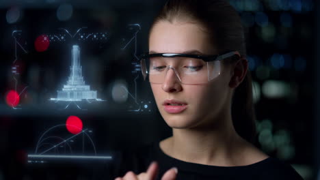 High-tech-glasses-woman-architect-inspecting-building-project-hologram-thinking
